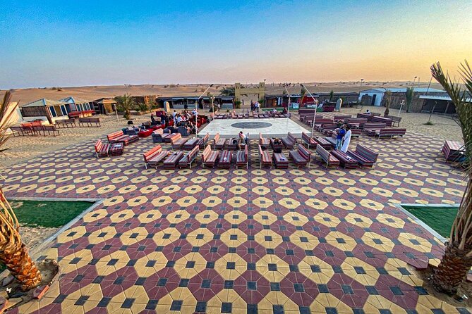 Guided Desert Safari with Dinner and Quad Biking in Dubai - Camel riding and sandboarding at sunset
