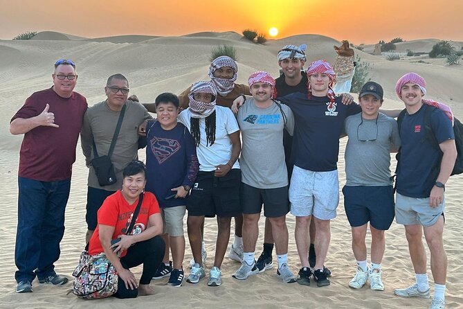 Guided Desert Safari with Dinner and Quad Biking in Dubai - Tanura, fire performance, and belly dancing