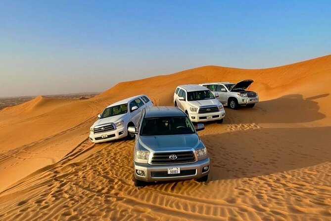 Guided Desert Safari with Dinner and Quad Biking in Dubai - Barbecue buffet, fruit, dessert, and soft drinks