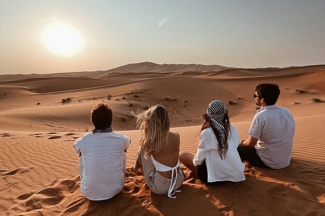 Half Day Desert Safari with Sand Boarding and Camel Ride - Sand boarding on the dunes