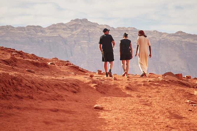 Half-Day Jeep Safari "Wadi Rum Highlights!" w/ Professional Bedouin Guide - Sandboarding and camel riding
