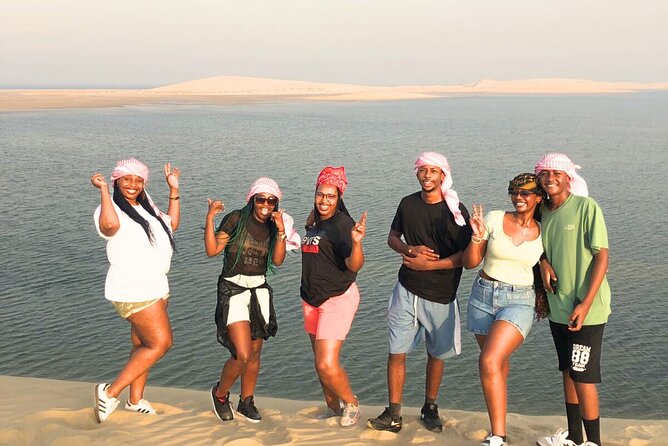 Half Day Safari Tour With Camel Ride and Sand Boarding in Doha - Dune bashing toward Khor Al Udaid