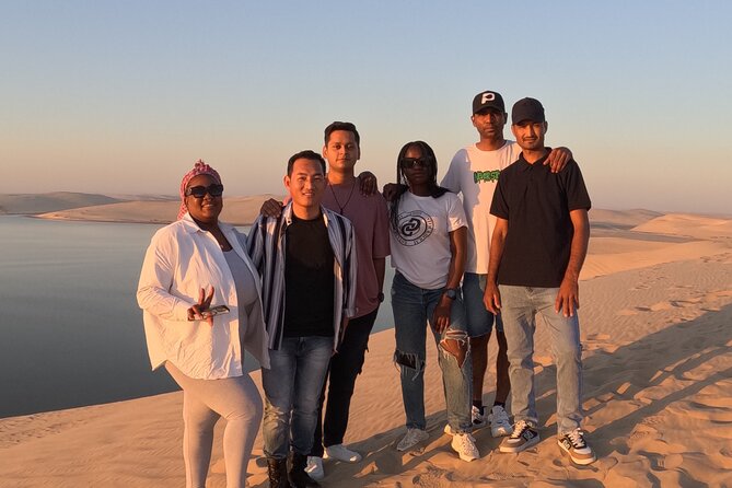 Half Day Safari Tour With Camel Ride and Sand Boarding in Doha - Reaching the inland sea at Khor Al Udaid