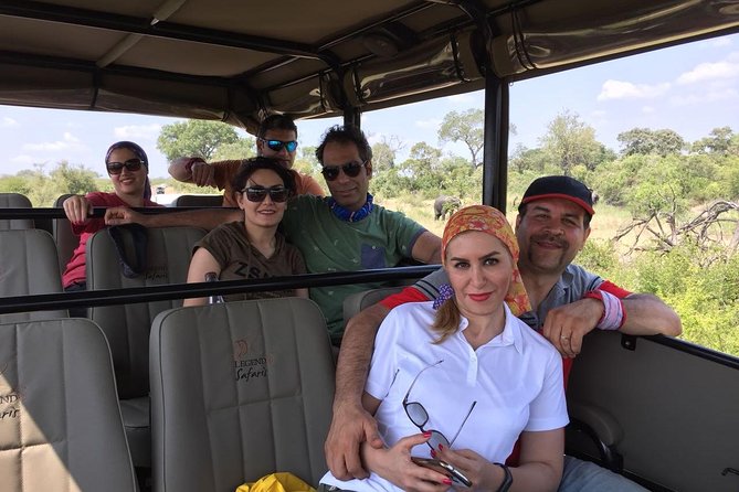 Kruger Safari Tour - Full Day - Entering Kruger in an open safari vehicle