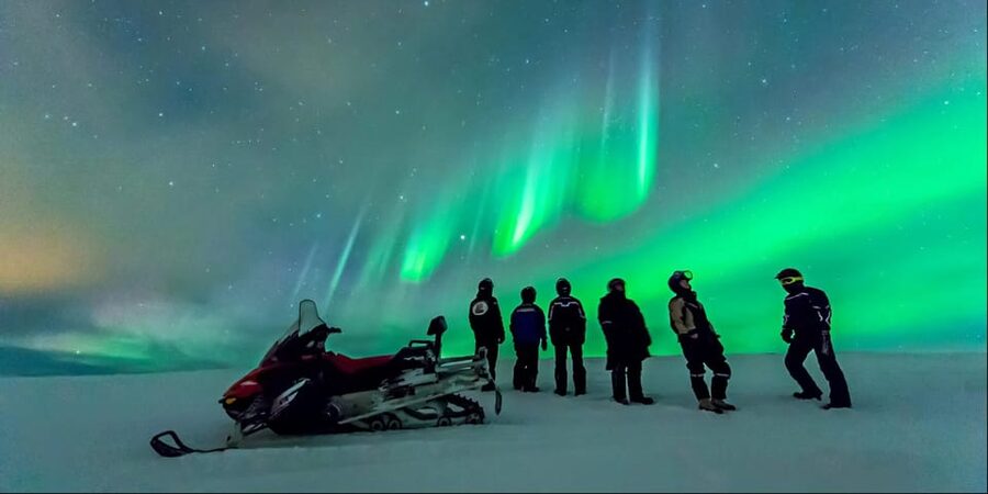 Levi: Northern Lights Snowmobile Safari and Campfire Picnic - Riding Through the Finnish Forest