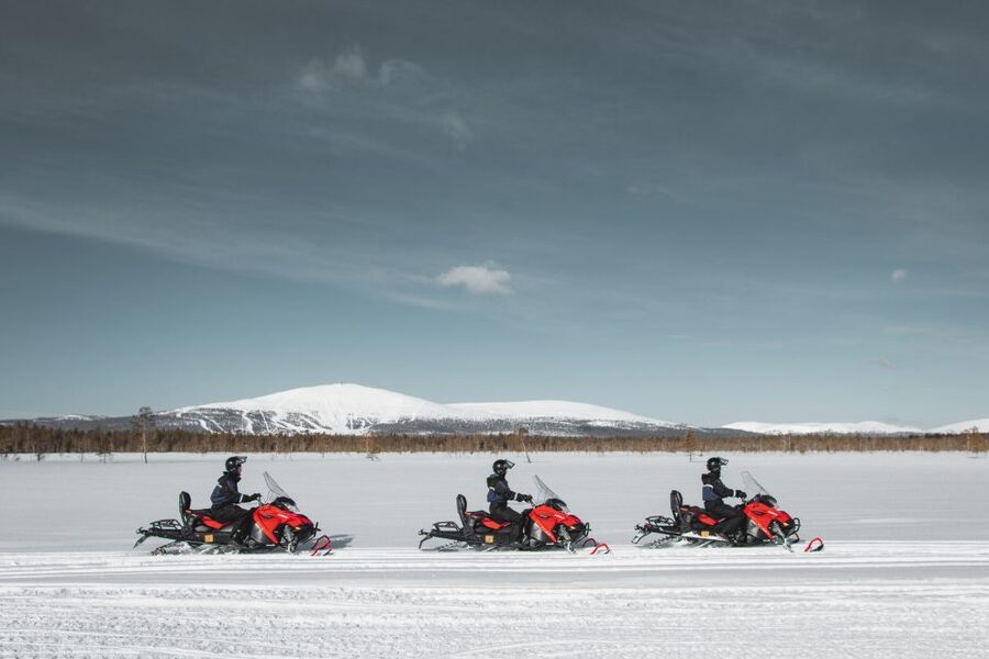 Levi: Snowmobile Safari with Ice Fishing and Outdoor Lunch - Learning the quiet side of Lapland at the ice hole