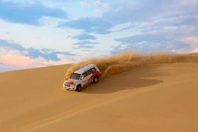 Morning Desert Safari From Abu Dhabi - Sand boarding and falcon photos