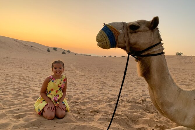 Morning Desert Safari, Quad Bike, Sandboard and Camel Ride - Quad biking at the Al Madam activity center