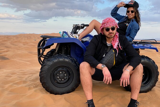 Morning Desert Safari, Quad Bike, Sandboard and Camel Ride - Sandboarding and the red-dune photo stop