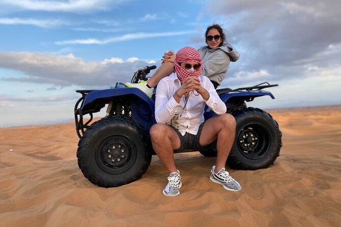 Morning Desert Safari, Quad Bike, Sandboard and Camel Ride - Dates, Arabic coffee, and a welcome pause