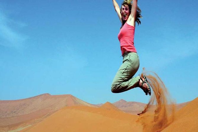 Morning Red Dunes Safari: Camel Ride & Sandboarding Adventure - Photos, water, and the brisk schedule