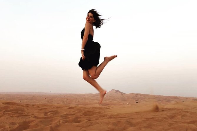 Morning Red Dunes Safari: Camel Ride & Sandboarding Adventure - Guides, driving, and the people side of the trip