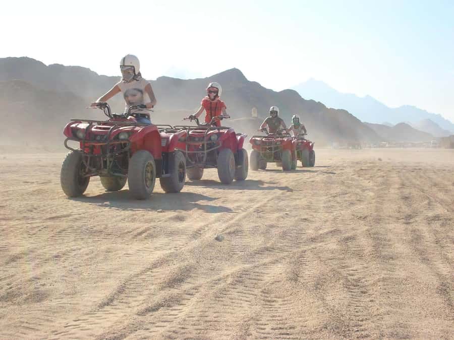 Morning Trip: Desert Safari Riding a Speed Quad Bike, Pickup - Heat, shade, and physical effort
