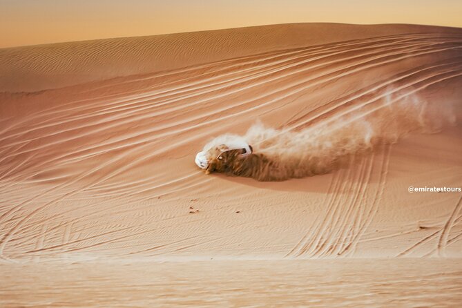 Overnight Desert Safari with BBQ Dinner & Breakfast Abu Dhabi - Belly dance, Tanoura, and fire performance