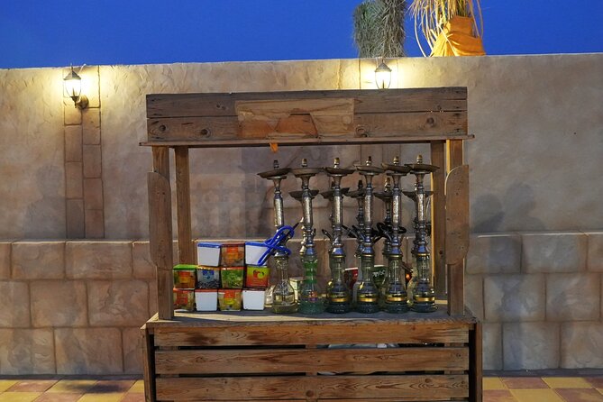 Premium Deluxe Dubai Safari with Camel Ride, Sandboard & BBQ - BBQ dinner and an evening of stage shows