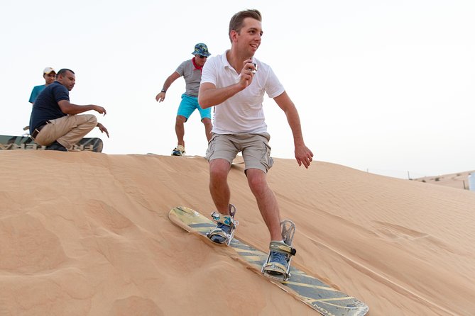 Premium Dubai Desert Safari with BBQ Dinner in the Red Dunes - A Short Camel Ride at the Farm