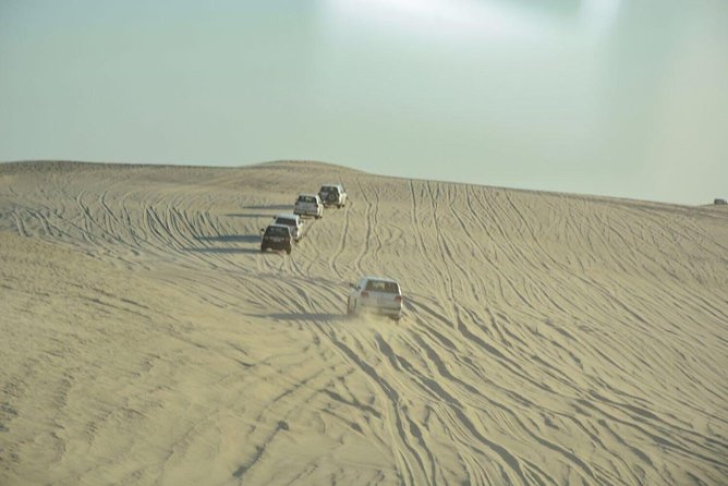Premium Full-Day Safari, Dune Bash, Camel Ride and BBQ Meal in Desert Camp - From Doha to the open sand