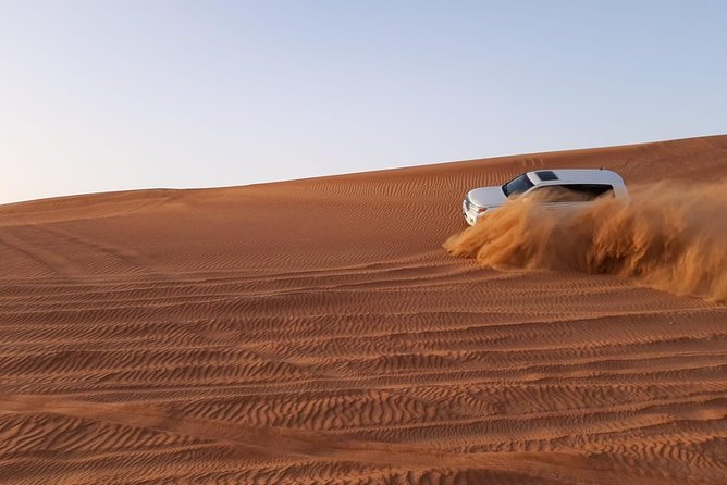 Private Desert Safari Red Dune with BBQ, Sand Boarding and Camel Ride - Sandboarding from the highest dune