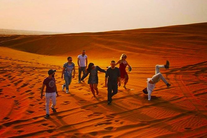 Private Desert Safari Red Dune with BBQ, Sand Boarding and Camel Ride - Sunset over the Lahbab desert