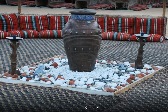 Private Desert Safari Red Dune with BBQ, Sand Boarding and Camel Ride - Camel farm and a short camel ride