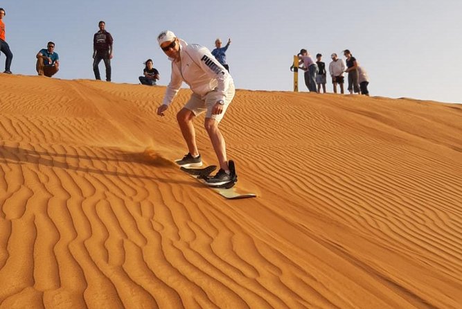 Private Desert Safari Red Dune with BBQ, Sand Boarding and Camel Ride - BBQ buffet and live entertainment