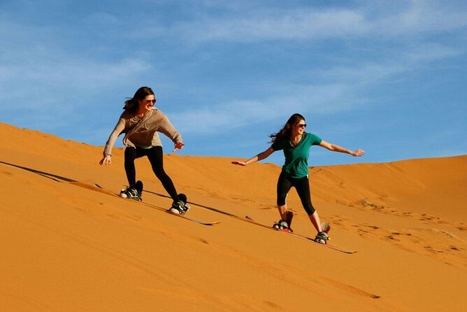 Private Evening Red Sand Desert Safari with BBQ Dinner - A short camel ride at the desert camp