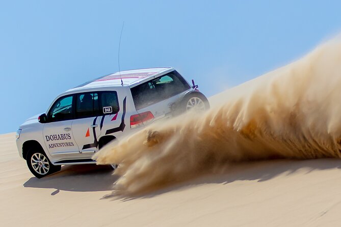 Qatar Half Day Desert Safari(Camel Rides & Sandboarding) - Refreshments and the Al Majles Resort stop