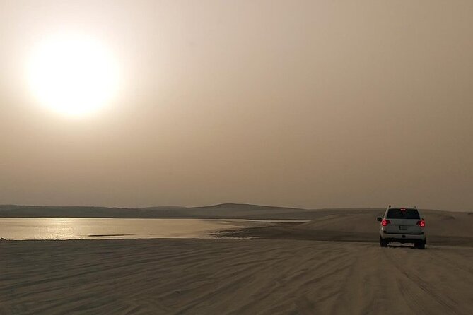 Qatar Sunset Desert Safari: Dune Bashing & Golden Sands Adventure - A camel camp stop with an important extra cost