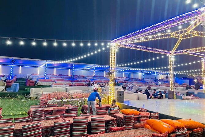 Red Dunes Desert Safari Dubai with Dinner Buffet, Show & Transfer - The desert camp after dark