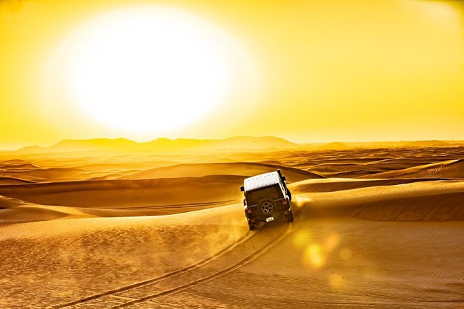 Red Dunes Desert Safari with 4x4 Pick up & Drop, Camel ride, BBQ and Live shows - Arabic coffee, dates, and the Bedouin-style camp