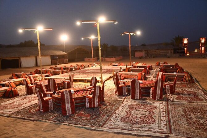 Red Dunes Desert Safari with BBQ Dinner - A short camel ride, tea, and camp arrival