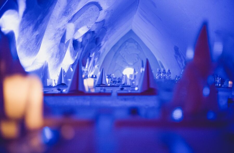 Rovaniemi: Snowmobile Safari to Arctic Snow Hotel - Glow-fried salmon in a warm Kota