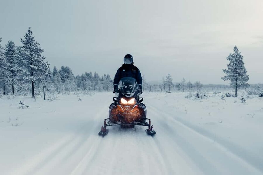 Ruka: Scenery Snowmobile Safari - Sharing one snowmobile with another rider