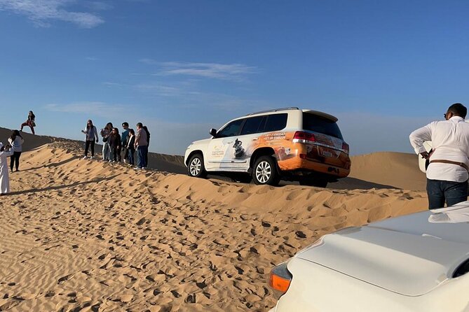 Safari Half-Day Adventure from Abu Dhabi - Camels, sand boards, and a working desert camp