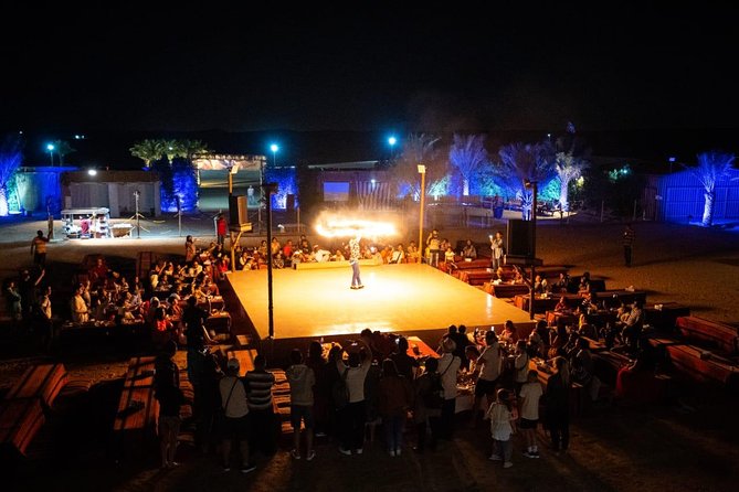 Standard Desert Safari, camel ride, BBQ Dinner, Belly Dance Show, Pick & Drop - What the $65 price really covers