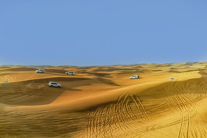Sunrise Desert Safari from Abu Dhabi - Sandboarding, Camel Riding, and Quad Biking