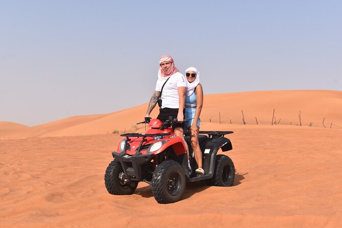 Sunset Desert Safari Quad bike Camel ride Sand Board & BBQ Dinner - A Six-Hour Desert Evening From Dubai