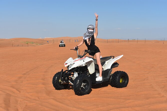 Sunset Desert Safari Quad bike Camel ride Sand Board & BBQ Dinner - Quad Biking at Al Lahbab