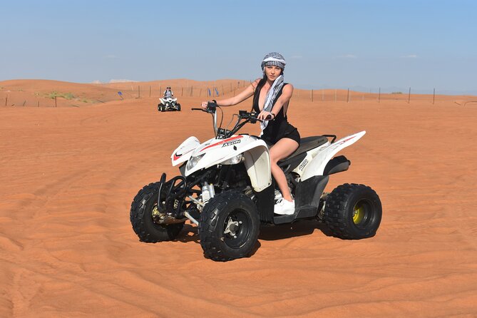 Sunset Desert Safari Quad bike Camel ride Sand Board & BBQ Dinner - Dune Bashing, Sandboarding, and Sunset Photos