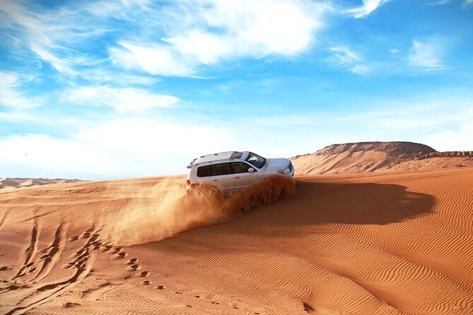 Thrilling 4-Hour Dune Bashing & Camel Ride Safari to Inland Sea - Leaving Doha by air-conditioned 4x4