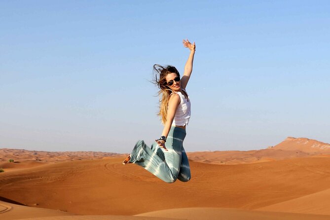 Thrilling Desert Safari Dubai Adventure with Sand Boarding and Barbecue Dinner - Sunset photographs in the open desert