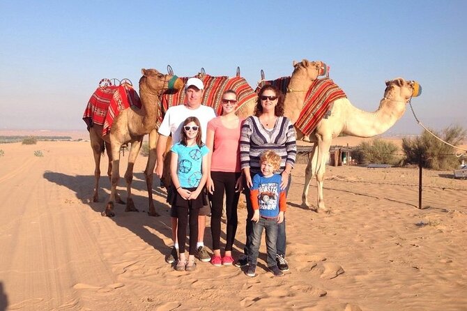 Thrilling Desert Safari Dubai Adventure with Sand Boarding and Barbecue Dinner - Henna, Arabic dress, and camp activities
