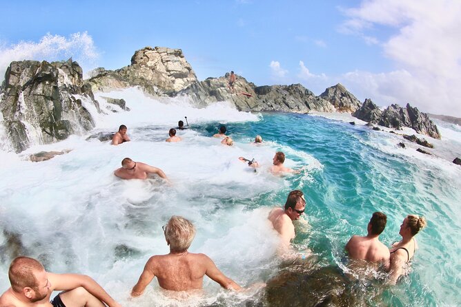 Ultimate Island Jeep Safari with Natural Pool, Baby Beach & Lunch - Natural Bridge and the island’s restless coast