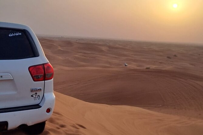 VIP Dubai Desert Safari with Quadbike,Sandboarding & BBQ dinner - A desert camp with a packed evening schedule